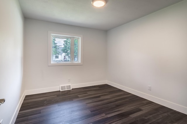 1020 1st St S, Cold Spring, MN 56320 - spare room featuring baseboards and dark wood-style floors