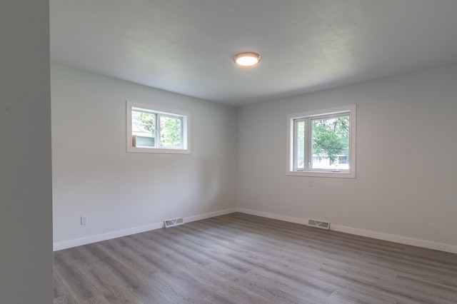 1020 1st St S, Cold Spring, MN 56320 - spare room featuring wood finished floors and baseboards