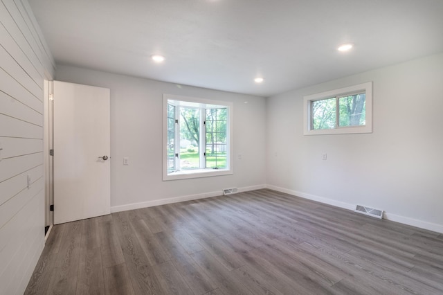 1020 1st St S, Cold Spring, MN 56320 - empty room featuring wood finished floors, baseboards, and recessed lighting