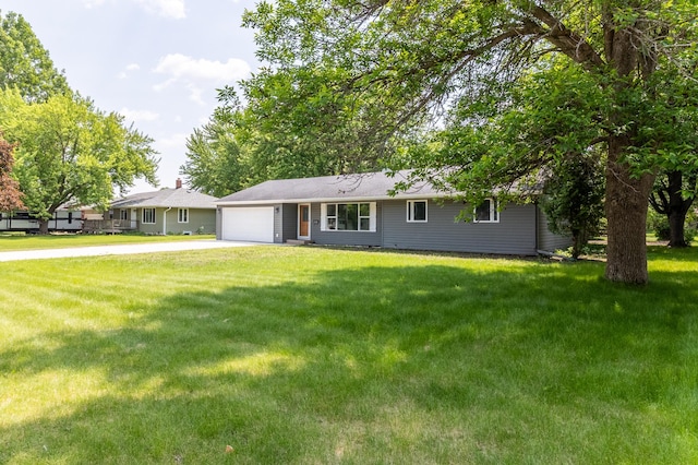 1020 1st St S, Cold Spring, MN 56320 - single story home with a garage, concrete driveway, and a front lawn