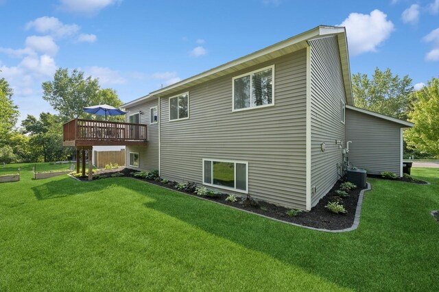 13362 Jefferson St, Becker, MN 55308 - rear view of property featuring a deck and a yard