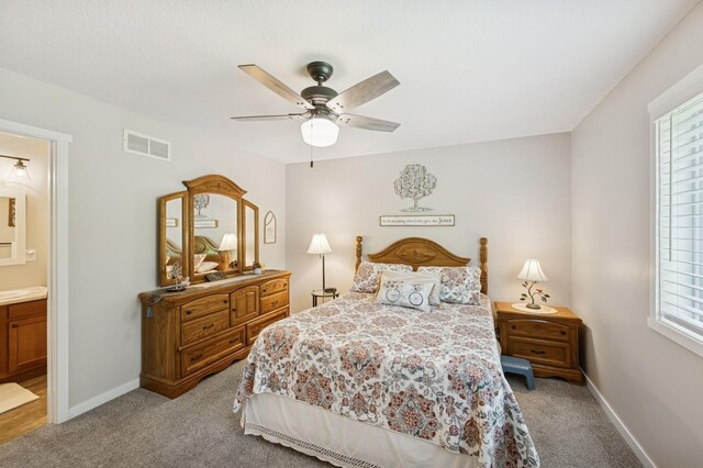 13362 Jefferson St, Becker, MN 55308 - bedroom with light carpet, ensuite bathroom, and baseboards