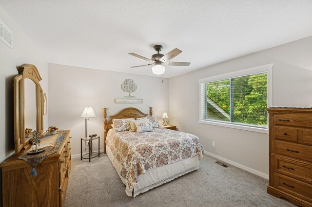 13362 Jefferson St, Becker, MN 55308 - bedroom featuring baseboards, light colored carpet, and ceiling fan