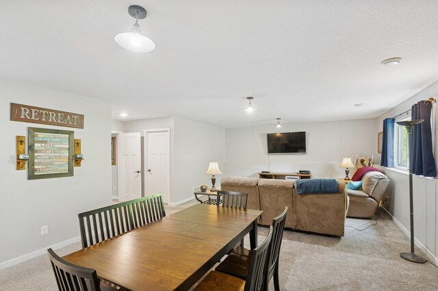 13362 Jefferson St, Becker, MN 55308 - dining area featuring baseboards and light carpet