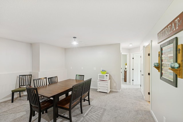 13362 Jefferson St, Becker, MN 55308 - dining area featuring light carpet and baseboards