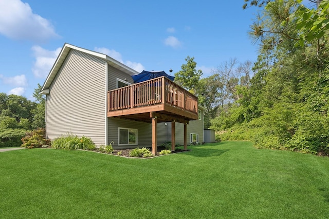 13362 Jefferson St, Becker, MN 55308 - rear view of house with a wooden deck and a yard
