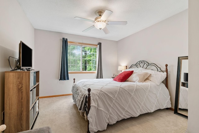 8345 Corcoran Cir Unit 42, Inver Grove Heights, MN 55076 - bedroom with light carpet, baseboards, and ceiling fan