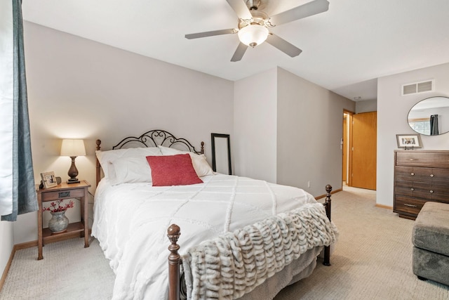 8345 Corcoran Cir Unit 42, Inver Grove Heights, MN 55076 - bedroom featuring light colored carpet, baseboards, and a ceiling fan