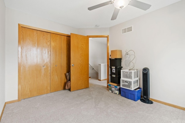 8345 Corcoran Cir Unit 42, Inver Grove Heights, MN 55076 - unfurnished bedroom featuring carpet floors, a closet, baseboards, and ceiling fan