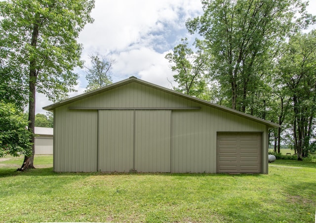 19214 County Road 12, Irondale Twp, MN 56455 - view of pole building featuring a yard and driveway