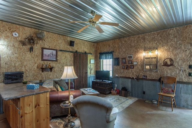 19214 County Road 12, Irondale Twp, MN 56455 - living room featuring a barn door, finished concrete flooring, and ceiling fan