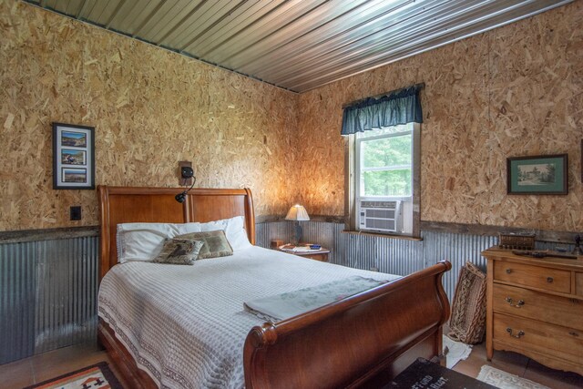 19214 County Road 12, Irondale Twp, MN 56455 - bedroom with wainscoting and cooling unit