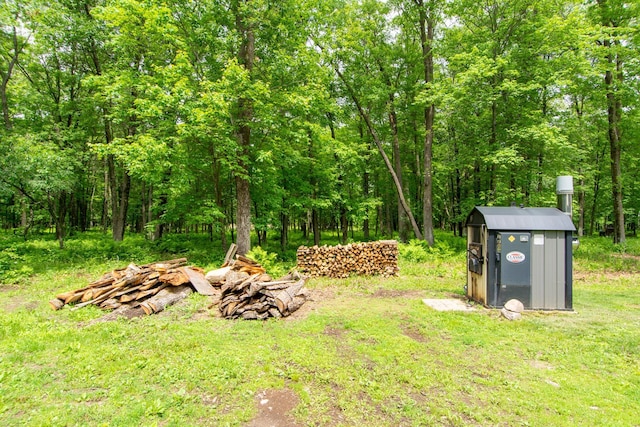19214 County Road 12, Irondale Twp, MN 56455 - view of yard featuring a forest view