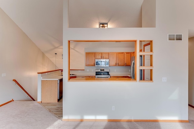 7539 Derby Ln, Shakopee, MN 55379 - kitchen featuring stainless steel appliances, baseboards, and light countertops