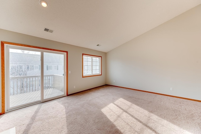 7539 Derby Ln, Shakopee, MN 55379 - carpeted empty room featuring baseboards and vaulted ceiling