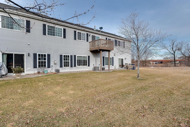 7539 Derby Ln, Shakopee, MN 55379 - rear view of property featuring central AC, a lawn, and a balcony