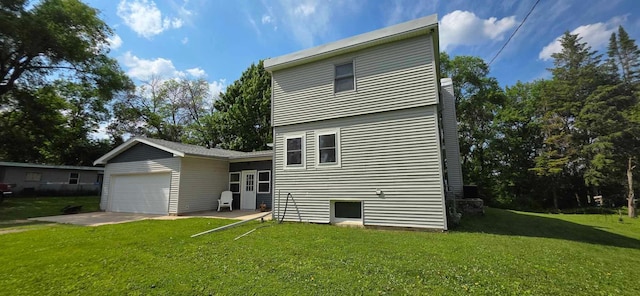 17548 749th Ave, Albert Lea Twp, MN 56007 - back of house featuring a yard and a garage