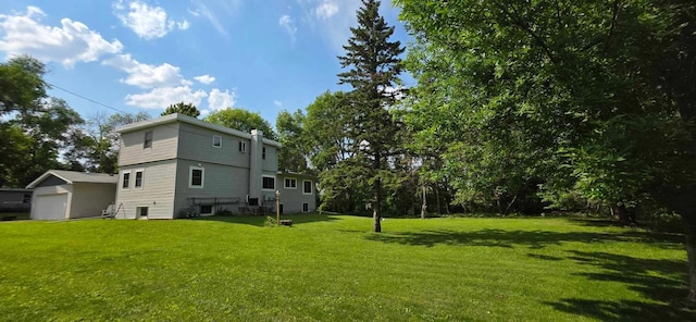 17548 749th Ave, Albert Lea Twp, MN 56007 - view of grassy yard featuring a garage