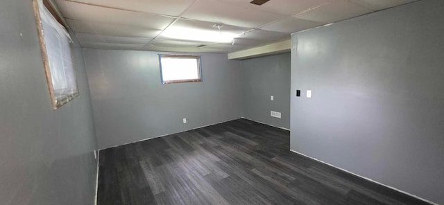 17548 749th Ave, Albert Lea Twp, MN 56007 - basement with a drop ceiling and dark wood-type flooring
