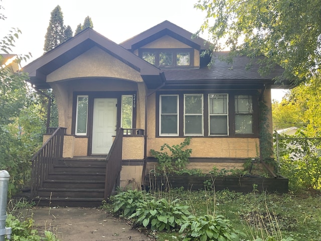 2430 Logan Ave N, Minneapolis, MN 55411 - view of front facade featuring stucco siding
