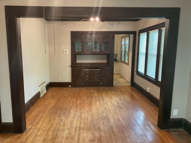 2430 Logan Ave N, Minneapolis, MN 55411 - spare room with hardwood / wood-style flooring and baseboards
