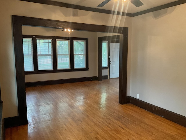 2430 Logan Ave N, Minneapolis, MN 55411 - spare room with plenty of natural light, wood finished floors, a ceiling fan, and baseboards