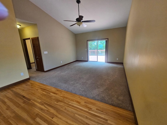 3657 46th Ave NW, Rochester, MN 55901 - empty room featuring a ceiling fan, vaulted ceiling, baseboards, and wood finished floors