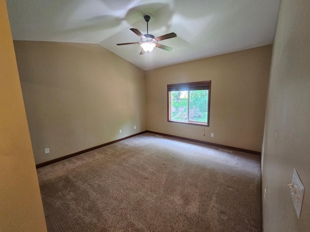 3657 46th Ave NW, Rochester, MN 55901 - carpeted empty room with a ceiling fan, lofted ceiling, and baseboards