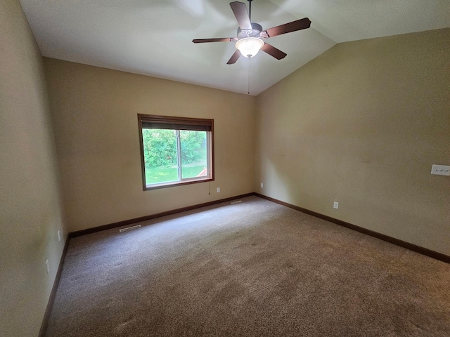 3657 46th Ave NW, Rochester, MN 55901 - empty room with carpet, a ceiling fan, vaulted ceiling, and baseboards