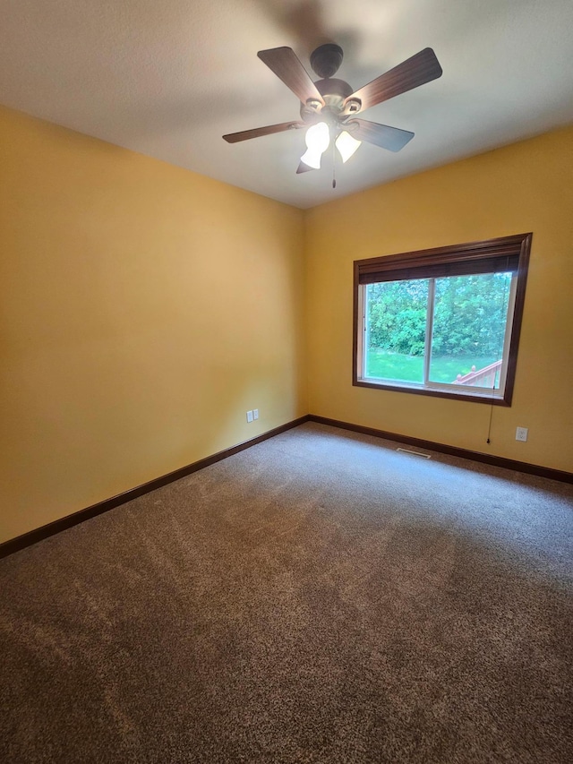 3657 46th Ave NW, Rochester, MN 55901 - carpeted empty room featuring baseboards and ceiling fan