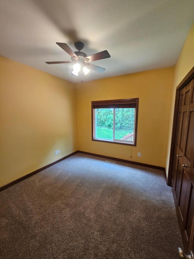 3657 46th Ave NW, Rochester, MN 55901 - unfurnished bedroom featuring carpet, baseboards, and a ceiling fan