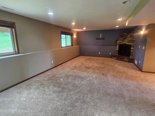 3657 46th Ave NW, Rochester, MN 55901 - unfurnished living room with carpet, recessed lighting, a fireplace, and baseboards