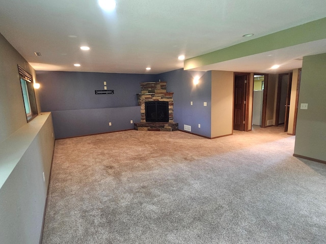 3657 46th Ave NW, Rochester, MN 55901 - unfurnished living room featuring light carpet, recessed lighting, and a fireplace