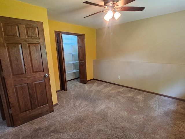 3657 46th Ave NW, Rochester, MN 55901 - unfurnished bedroom with carpet floors, baseboards, and a ceiling fan