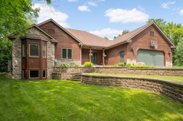 18510 Pheasant Ridge Rd, Credit River Twp, MN 55372 - view of front of home with stone siding, a front yard, and covered porch