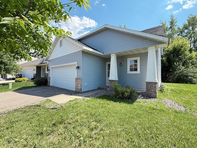 3100 212th St W, Farmington, MN 55024 - view of front of home with a garage, driveway, a front lawn, and a porch