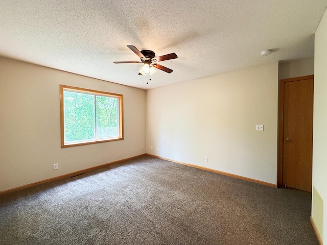 3100 212th St W, Farmington, MN 55024 - spare room with a ceiling fan, carpet flooring, baseboards, and a textured ceiling