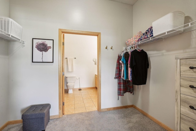 3310 Nicollet Ave Unit 302, Minneapolis, MN 55408 - spacious closet featuring carpet flooring and tile patterned floors