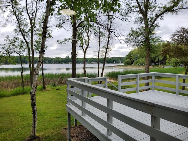 9803 287th Ave NW, Zimmerman, MN 55398 - wooden terrace with a yard and a water view