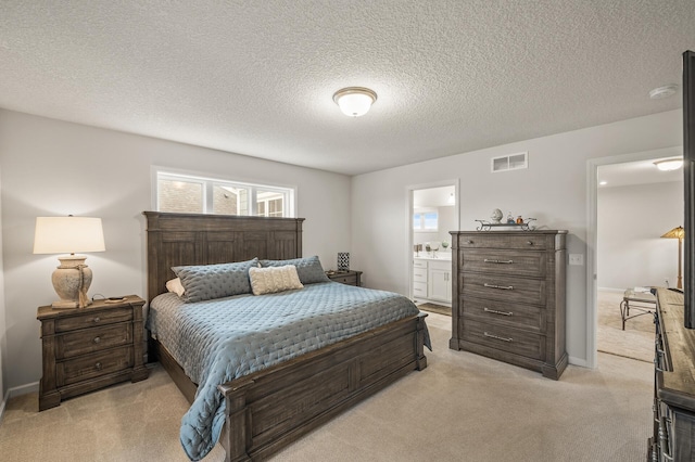 8738 Upper 9th Pl N, Lake Elmo, MN 55042 - bedroom with light carpet, ensuite bath, a textured ceiling, and baseboards