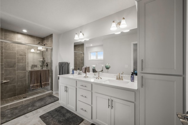 8738 Upper 9th Pl N, Lake Elmo, MN 55042 - bathroom featuring double vanity and a stall shower
