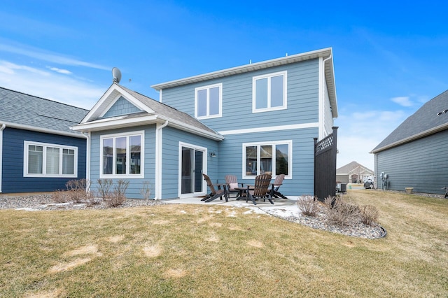 8738 Upper 9th Pl N, Lake Elmo, MN 55042 - back of property featuring a yard and a patio area