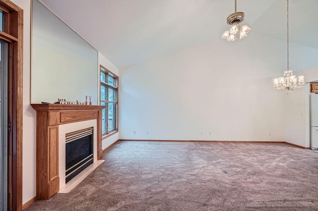 1584 126th Ln NW, Coon Rapids, MN 55448 - unfurnished living room with a chandelier, carpet flooring, a glass covered fireplace, and high vaulted ceiling