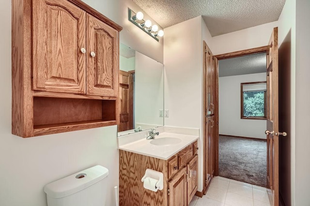1584 126th Ln NW, Coon Rapids, MN 55448 - half bath with a textured ceiling, vanity, and tile patterned floors