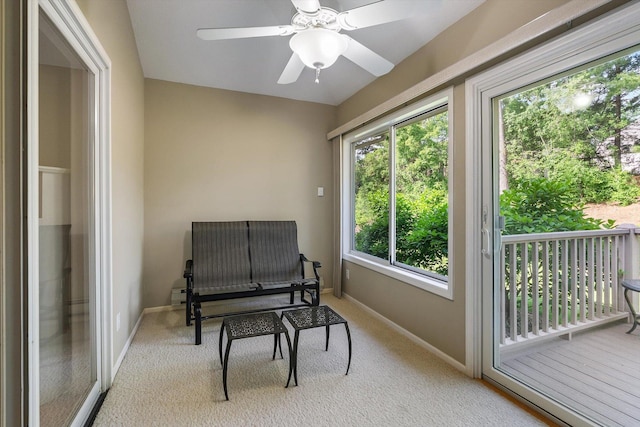 5555 70th St, Edina, MN 55439 - living area with light colored carpet, baseboards, and ceiling fan