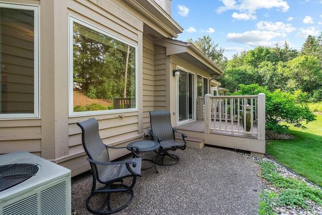 5555 70th St, Edina, MN 55439 - view of patio / terrace featuring central AC unit and a deck