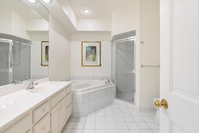 5555 70th St, Edina, MN 55439 - bathroom featuring tile patterned floors, vanity, a stall shower, a bath, and recessed lighting