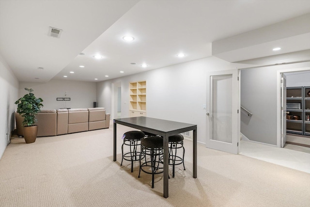 5555 70th St, Edina, MN 55439 - dining space with light colored carpet, recessed lighting, baseboards, and stairs