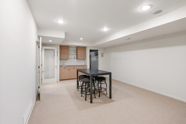 5555 70th St, Edina, MN 55439 - dining space featuring light colored carpet, recessed lighting, baseboards, and bar area