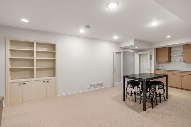 5555 70th St, Edina, MN 55439 - dining space with light carpet, recessed lighting, baseboards, and wet bar